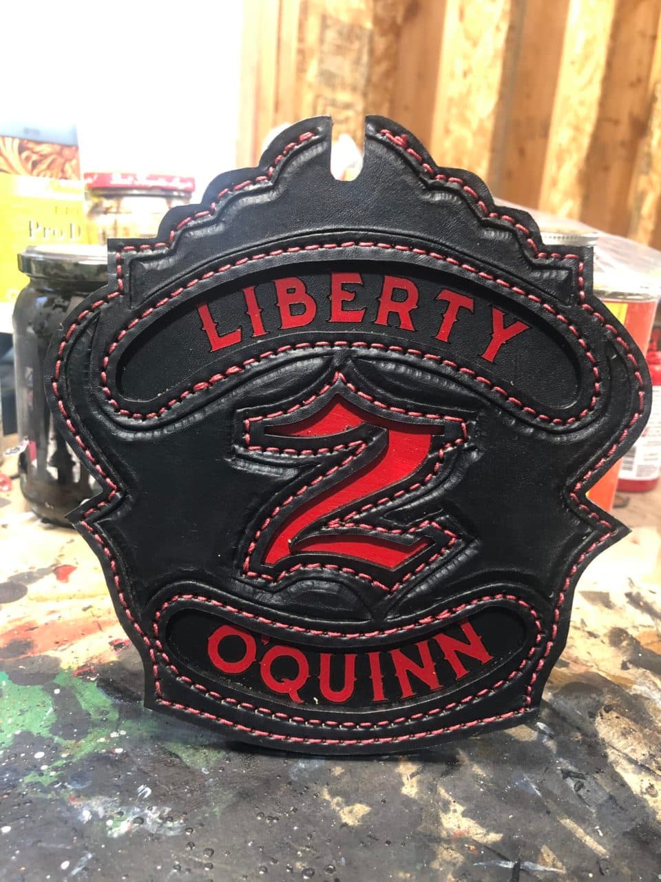 Crew shield with red stitching