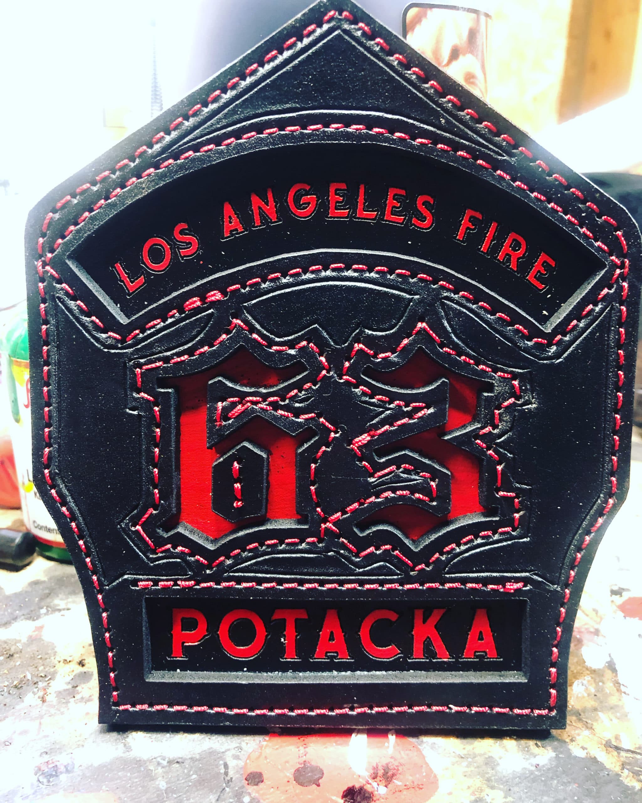 Classic shield black leather detail