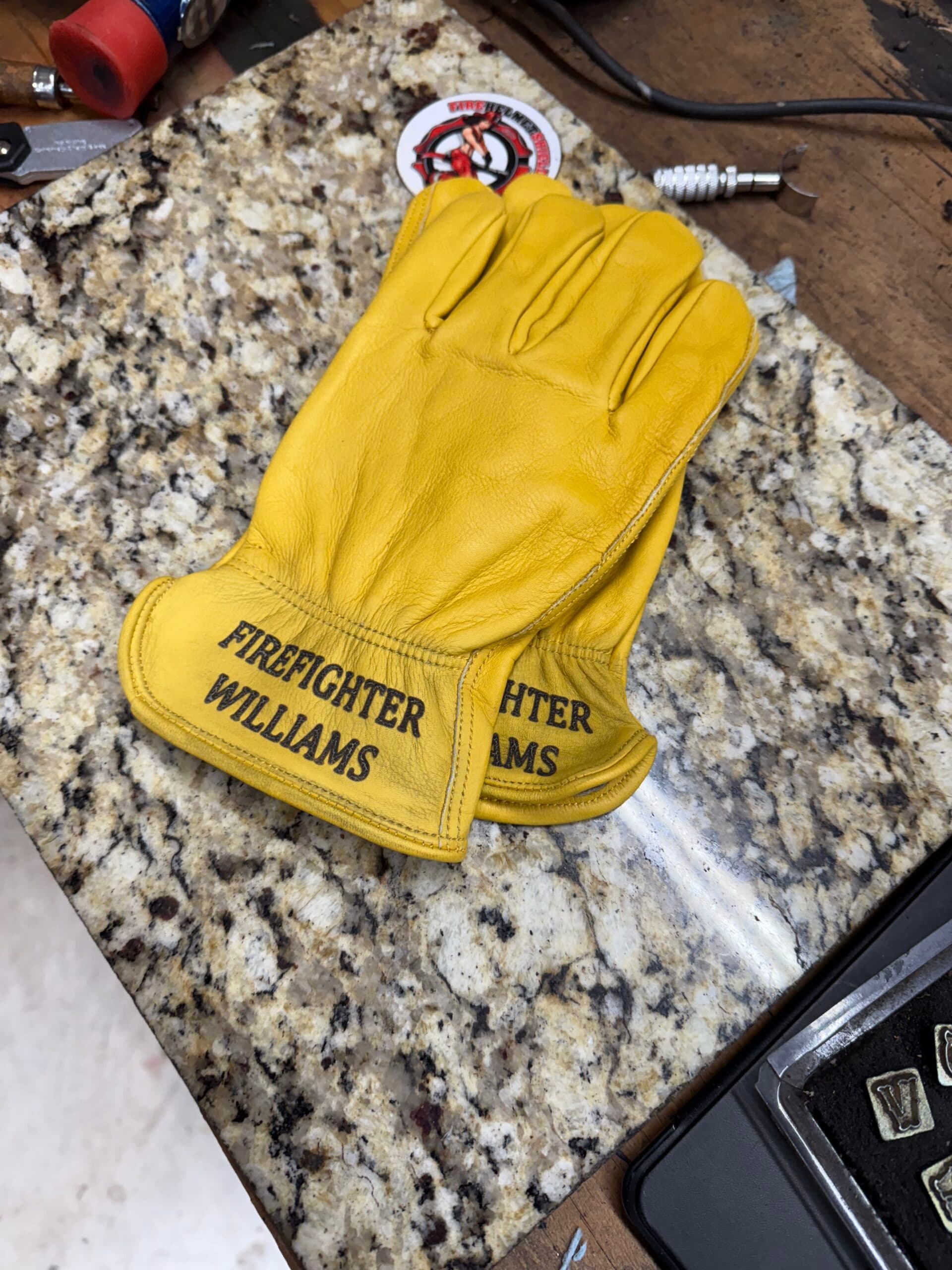 Work gloves engraved cuff detail