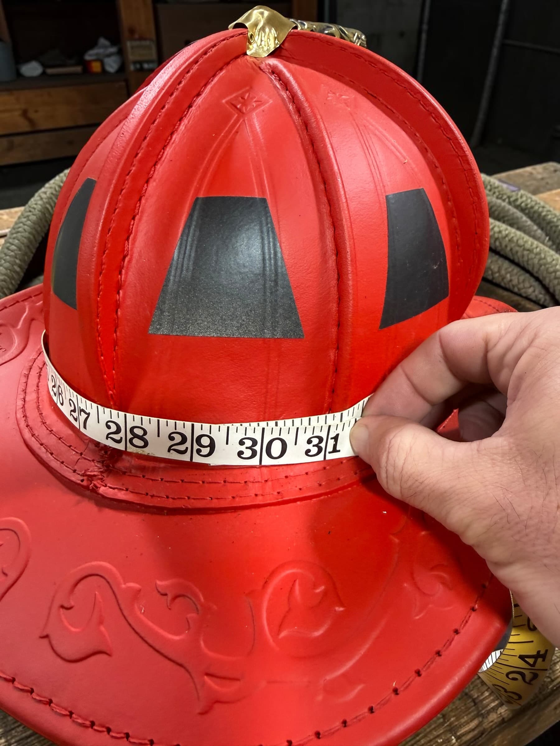 How to measure a fire helmet for a leather helmet band — wrap a tape around the bottom of the dome — view 7
