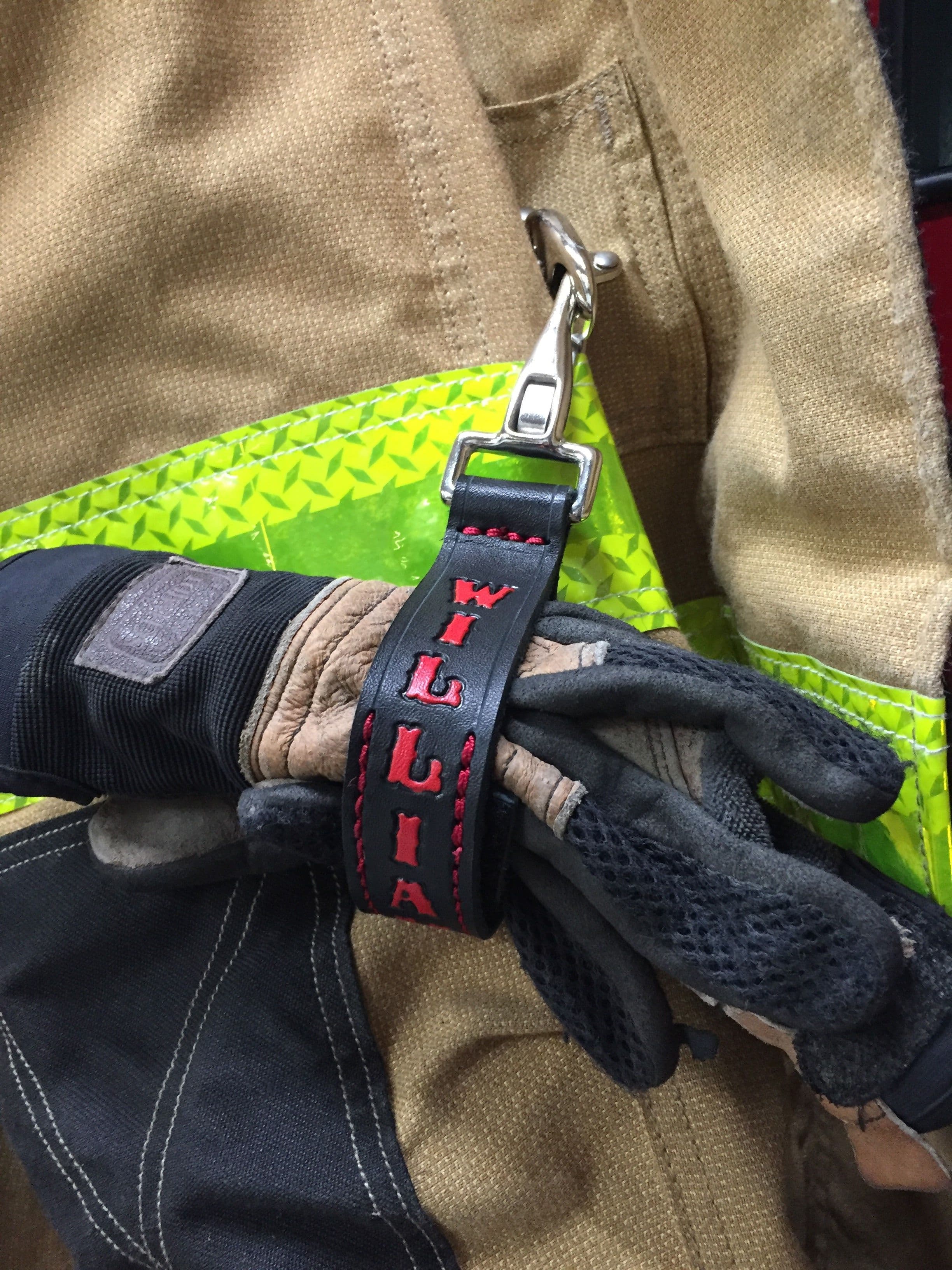 Firefighter glove strap on bunker gear