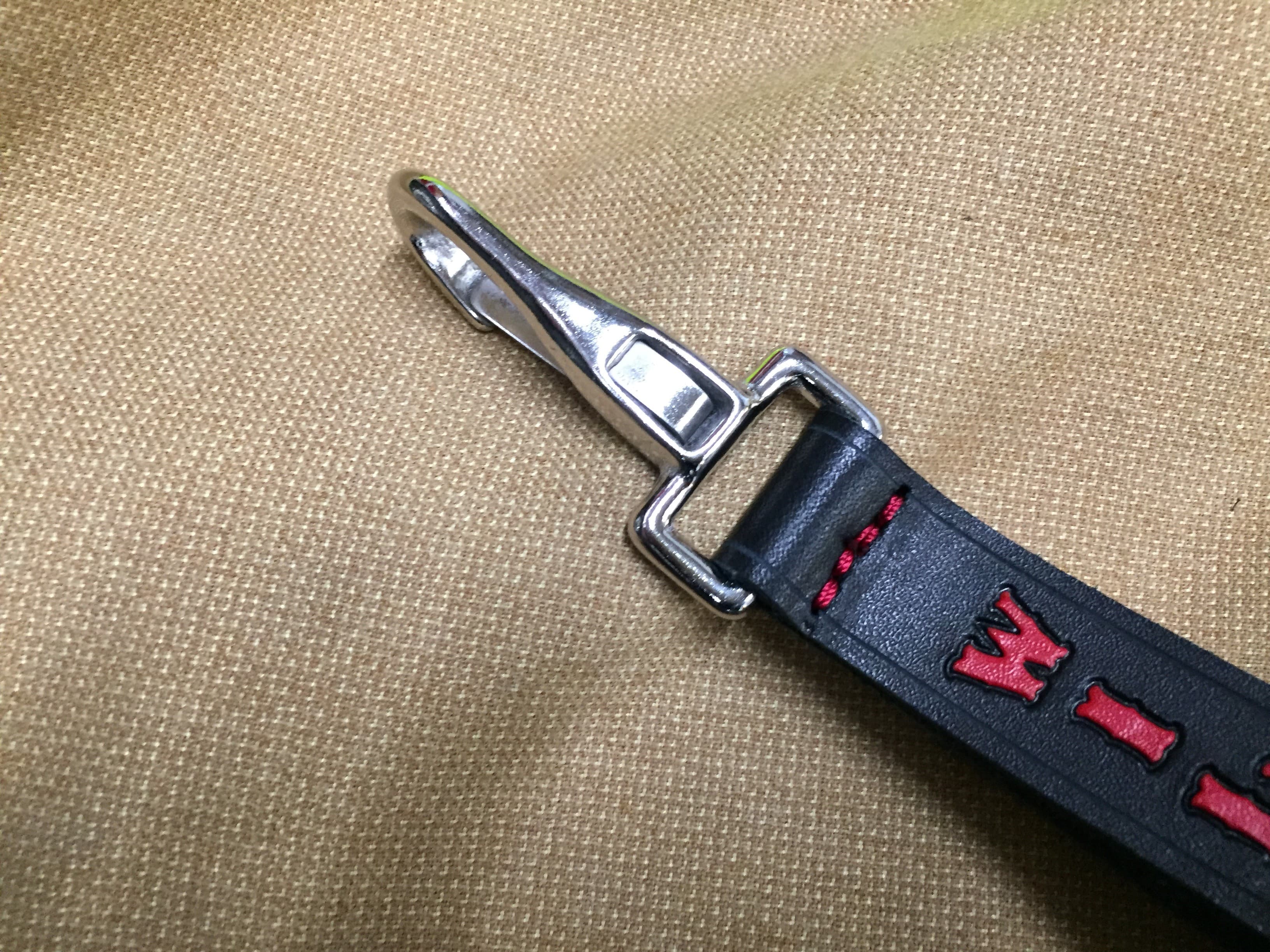 Leather glove tamer with hook