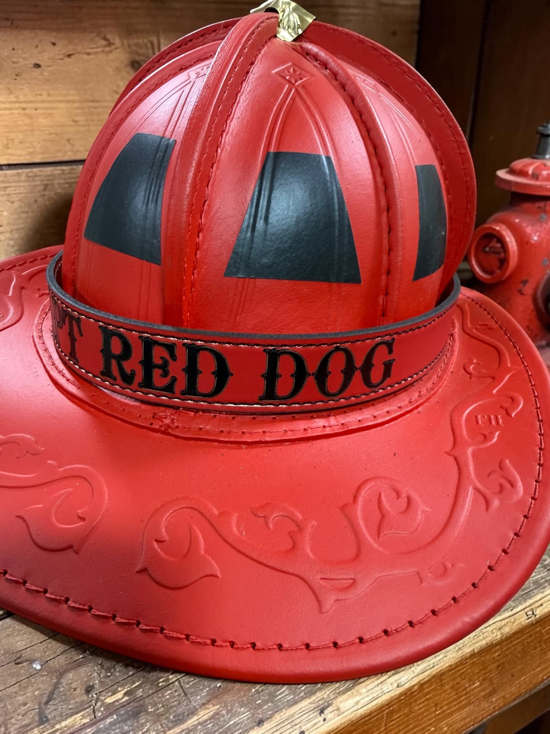 Firefighter helmet band stamped RED DOG in red paint on black leather — view 4