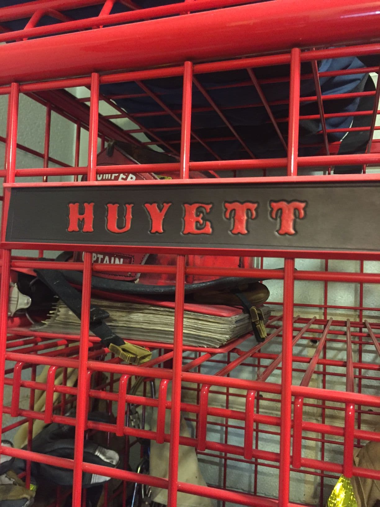 Locker nameplate on gear grid