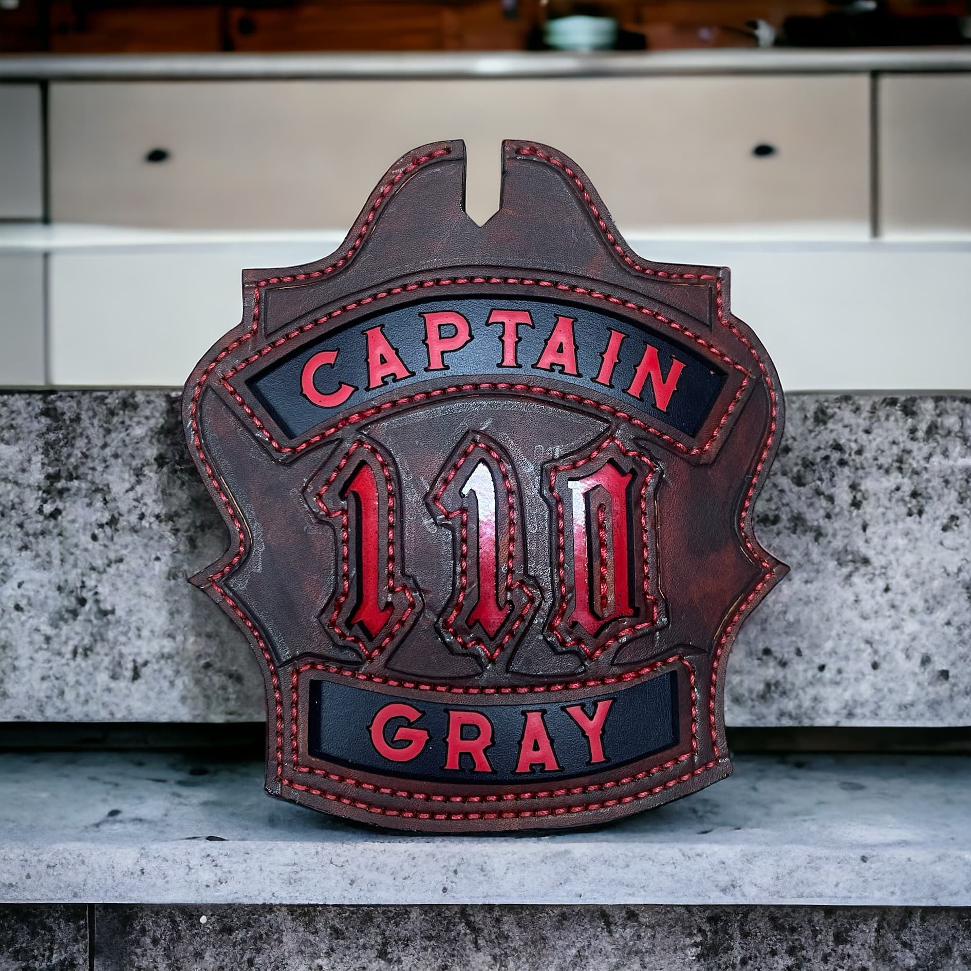 Kingpin shield white lettering